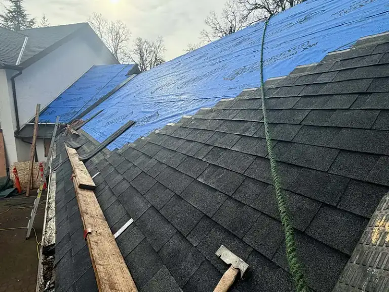 A Leading Edge Roofing crew working on a roof on Vancouver Island.